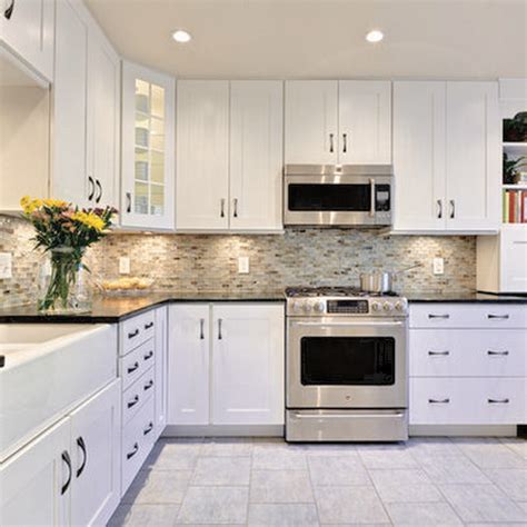 dark countertop w white cabinets stainless steel appliances|white cabinets with dark countertops.